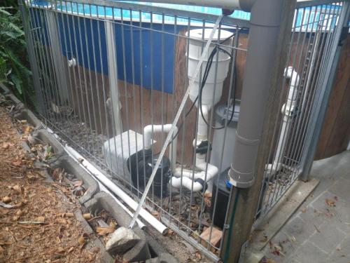 Pool pump, plumbing & chlorine drum within 300mm of inside of pool fence