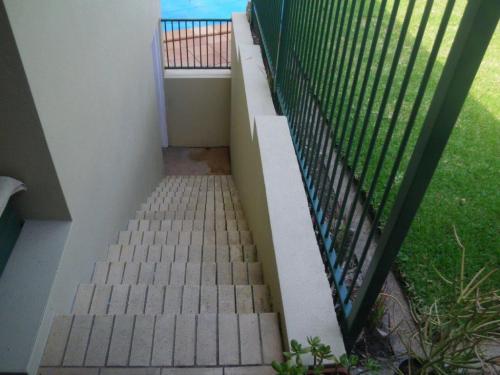 Mightn’t be able to fall down steps from lawn area but can clearly walk down top of wall 