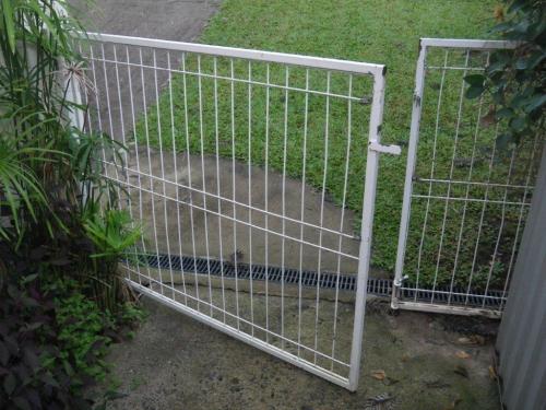 Garden gate at front of property leads directly into unfenced pool zone